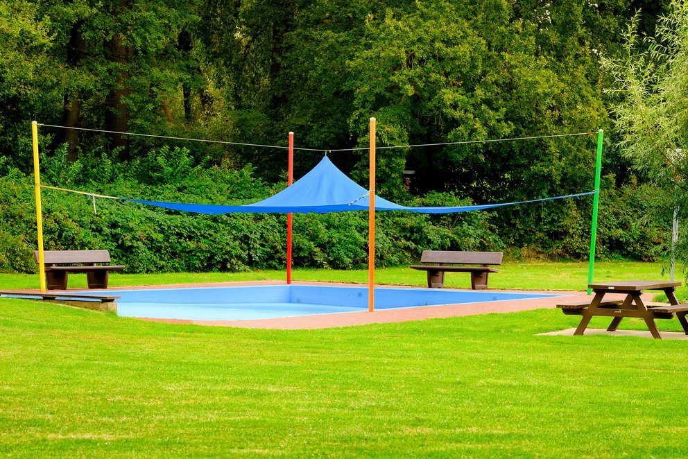 Freibad Velen Planschbecken im Grünen.